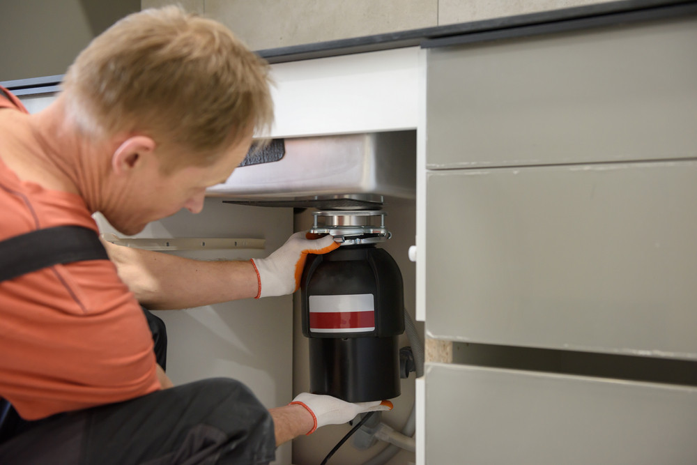 How Professional Garbage Disposal Installation Helps Prevent Kitchen Plumbing Problems
